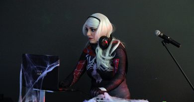 DJ Spider-Gwen, aka Lisa Martel, one of the co-organizers of the Halloween Howler works the decks.